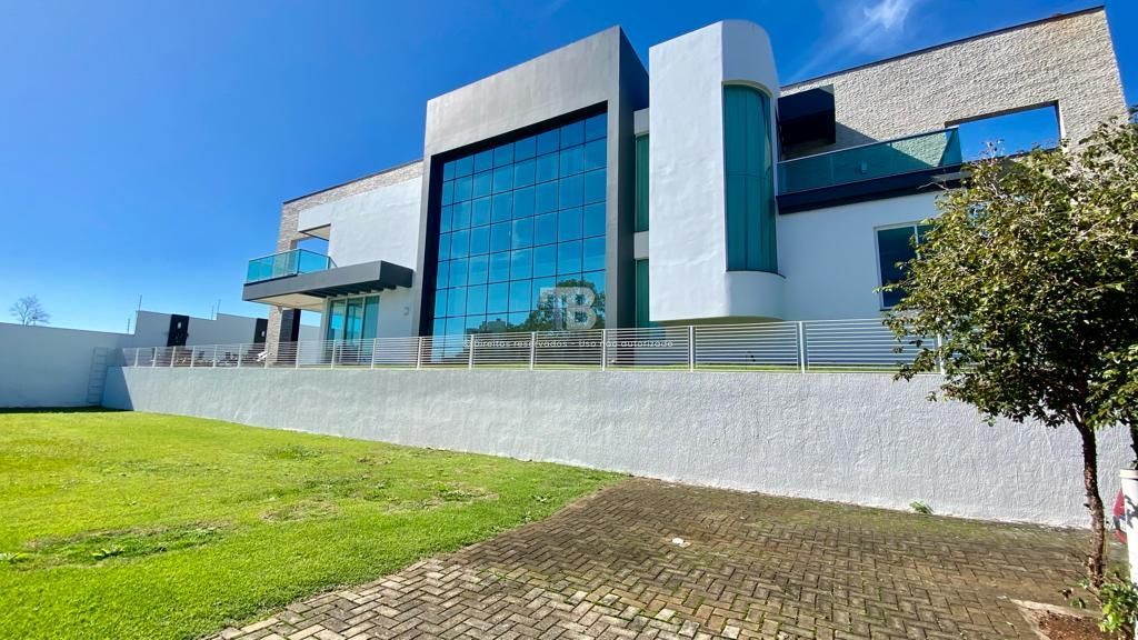 281 – Casa de condomínio com 4 quartos e 3 suítes no Centro, Chapecó à venda